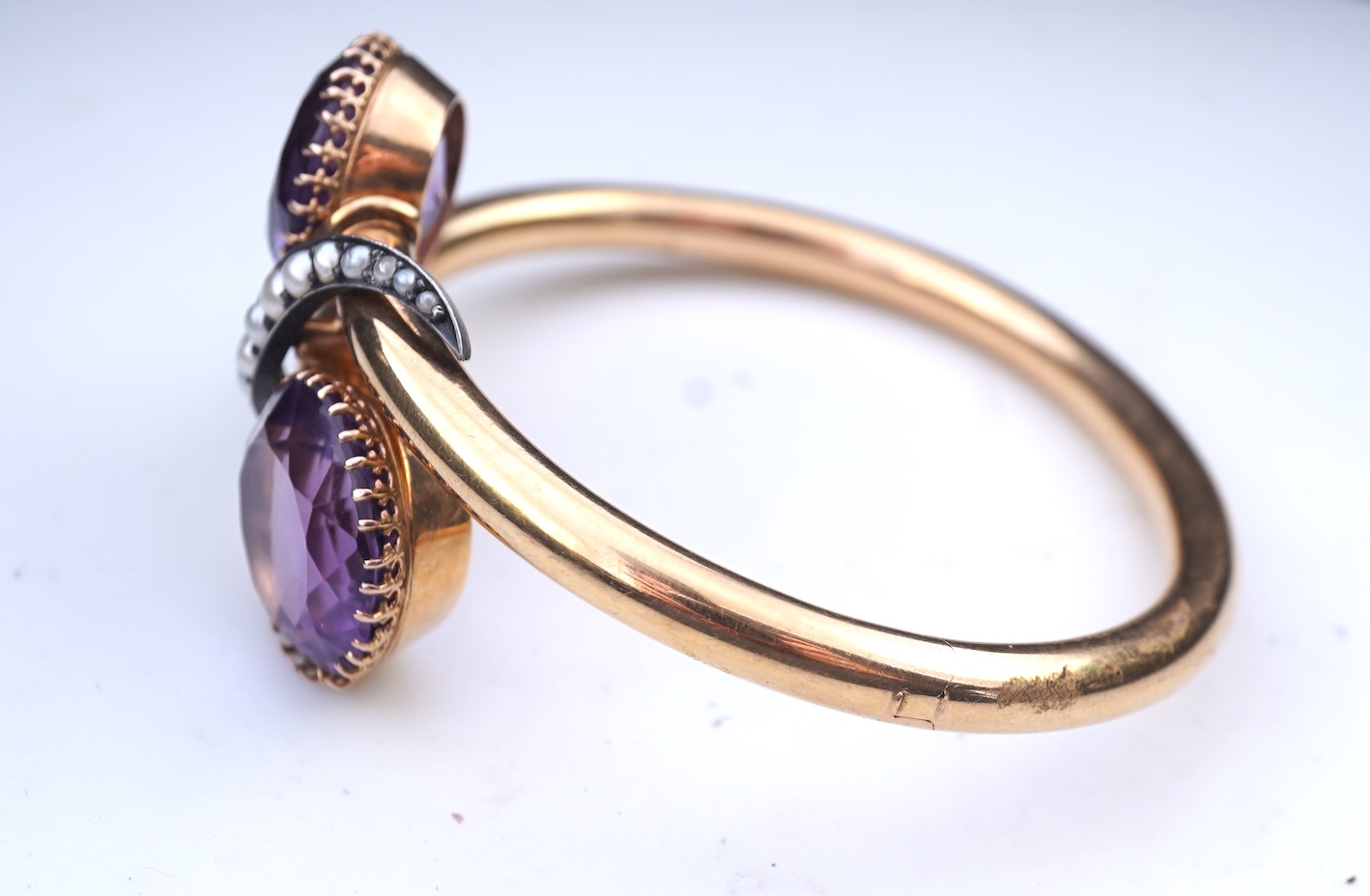 A Victorian gold, pearl and amethyst bangle, late 19th century
